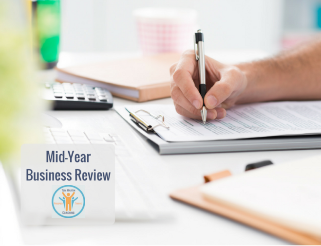 Photo Small Business Owner Mid-Year Business Review